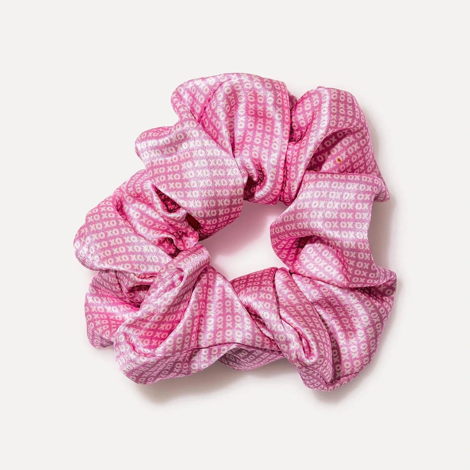 Elevate your hairstyle with our ILOVEUBABE XO® COUTURE Silk Scrunchie. Super luxe and silky smooth, it’s incredibly soft and gentle on all hair types, making it a beautiful statement piece for your best look.