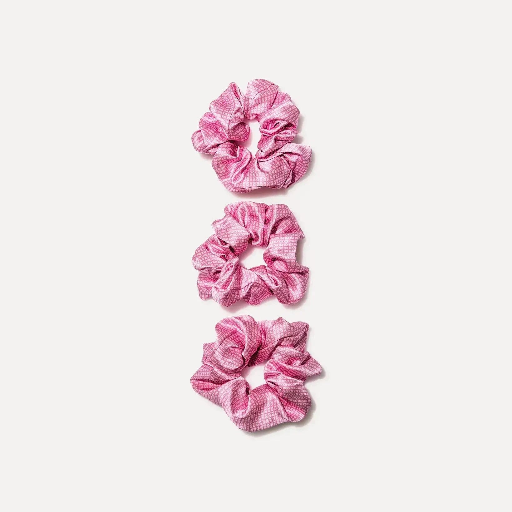 Discover the beauty of the ILOVEUBABE XO® COUTURE Silk Scrunchie. Super luxe and silky smooth, it’s a stylish statement that’s gentle on all hair types, making it perfect for any look.