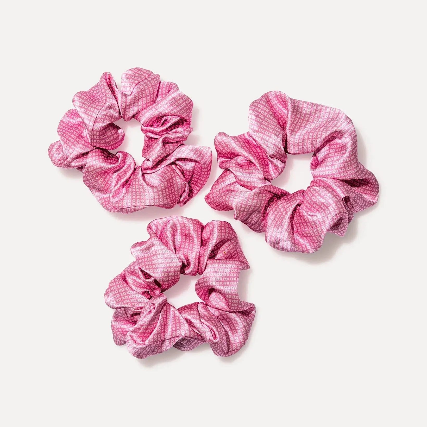 Our ILOVEUBABE XO® COUTURE Silk Scrunchie is not only a beautiful accessory but also incredibly soft and gentle on all hair types. Experience the luxury of silk in your everyday style.