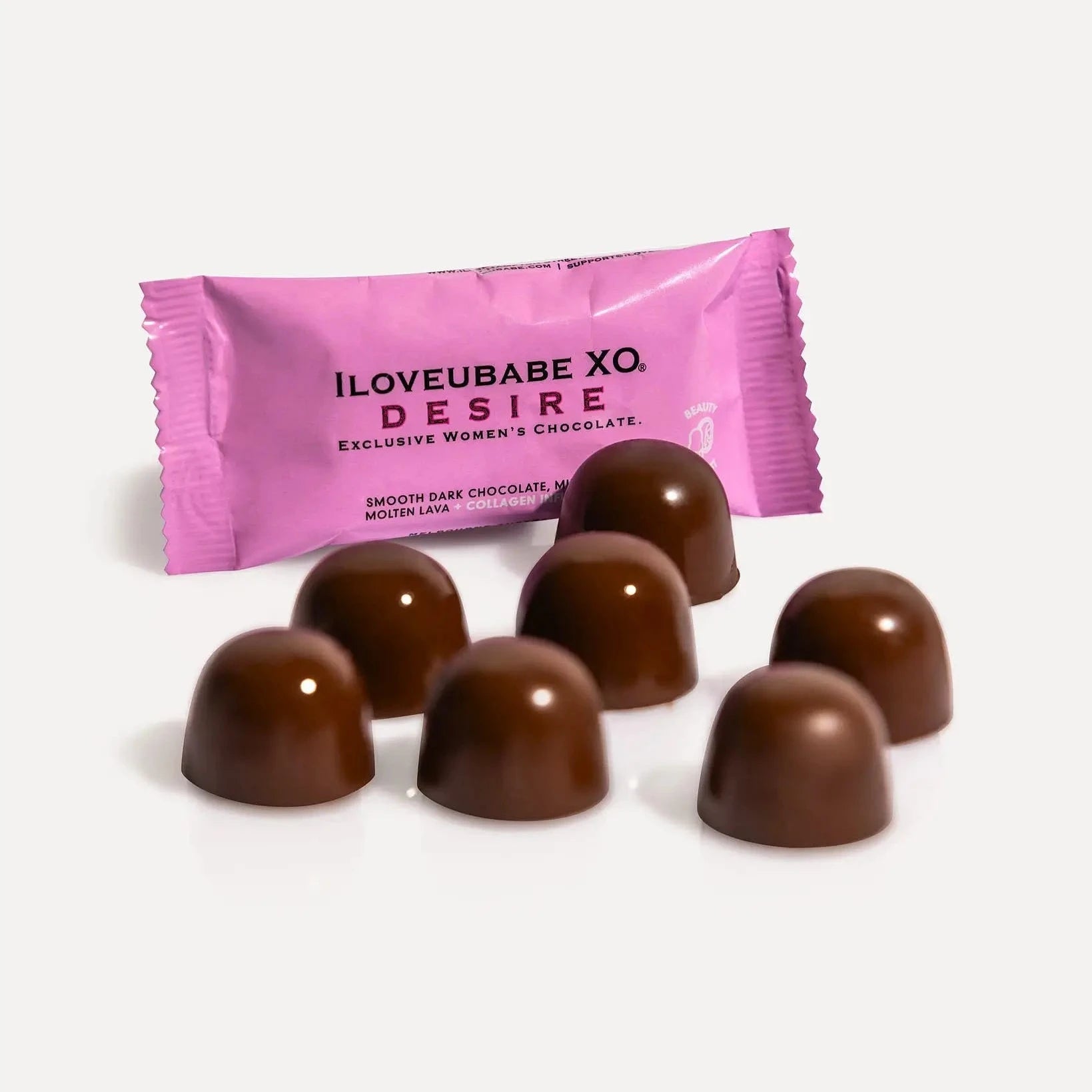 Elevate your beauty routine with the ILOVEUBABE XO® DESIRE Girlie Ten-Day Chocolate Gift Box, featuring 10 POWERPRALINES of rich dark chocolate with a focus on enhancing your beauty and well-being.