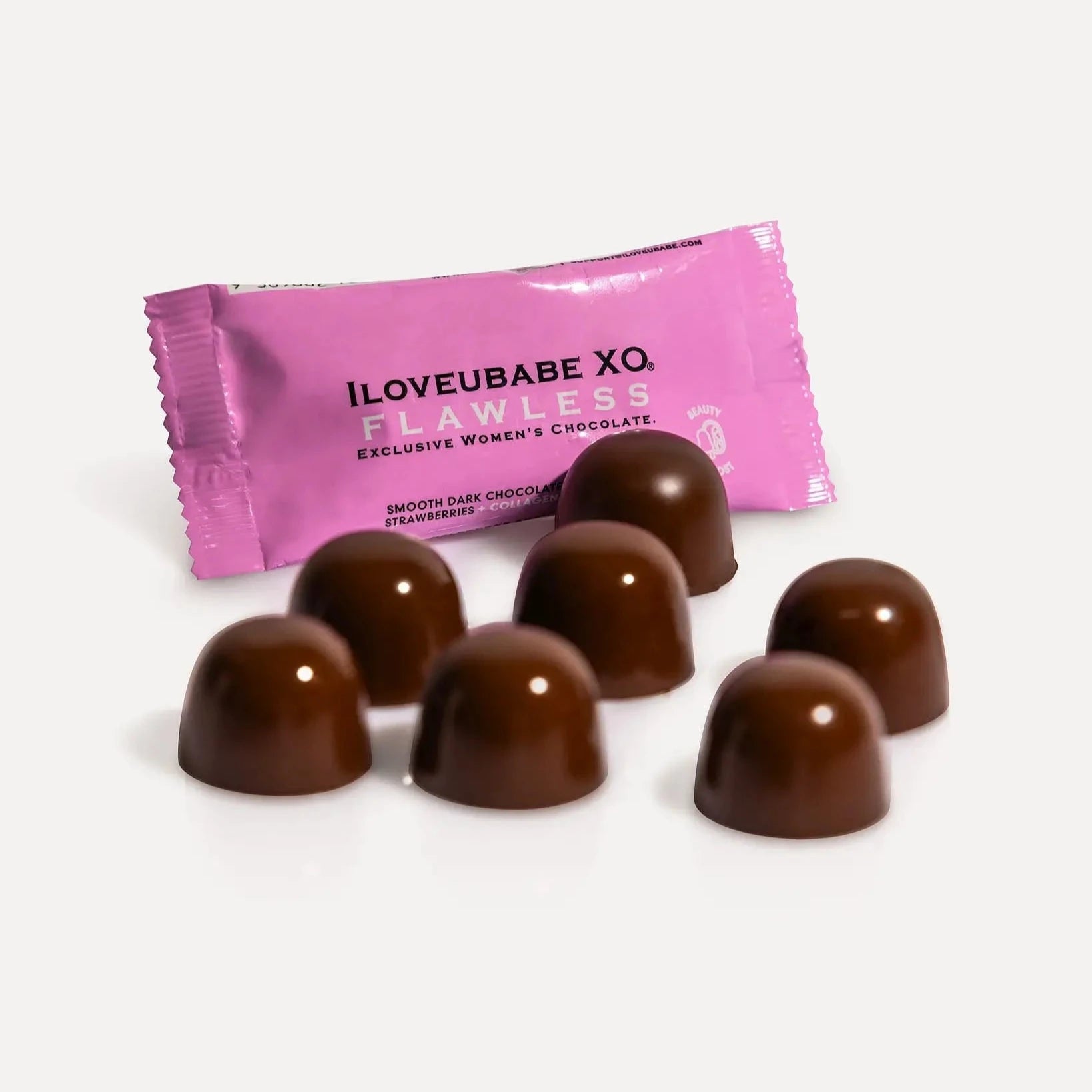 Smooth dark chocolate pralines with glitter shimmer wild strawberries and collagen crafted for women’s beauty and wellness boost.